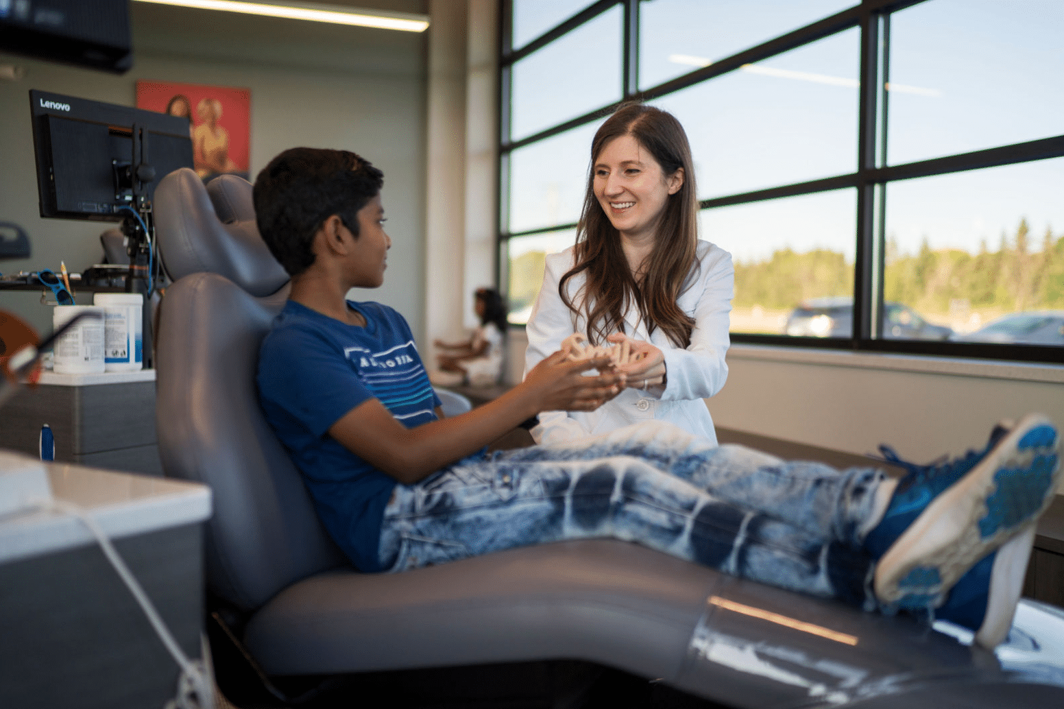 Dr-horton-with-young-boy-patient-horton-orthodontics Complimentary consultation