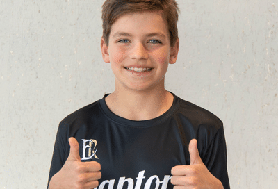 Which is right for you? Braces vs aligners 3 Smiling boy giving thumbs up at horton orthodontics, representing braces vs aligners