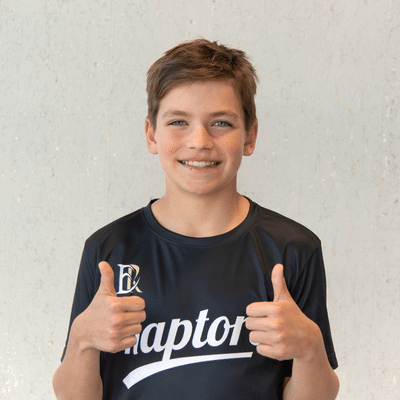 Which is right for you? Braces vs aligners 3 Smiling boy giving thumbs up at horton orthodontics, representing braces vs aligners